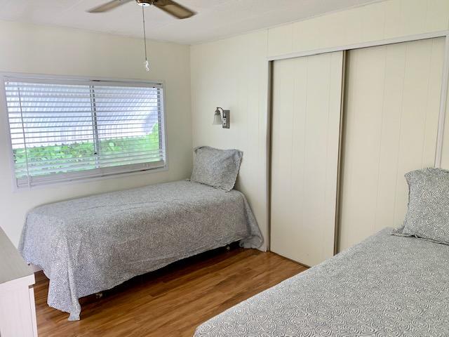 702 North Silver Circle Key Largo, FL 33037 - Photo 16 of 38 a bedroom with a bed and a window