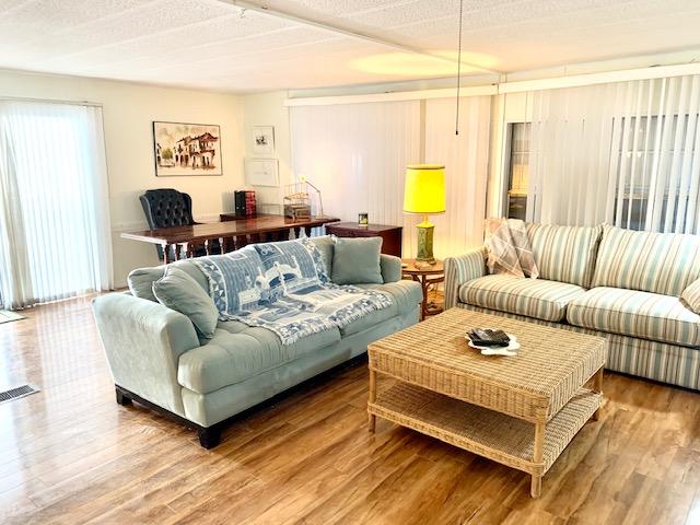 702 North Silver Circle Key Largo, FL 33037 - Photo 5 of 38 a living room with furniture and a large window
