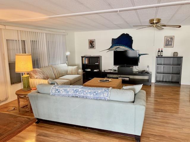 702 North Silver Circle Key Largo, FL 33037 - Photo 7 of 38 a living room with furniture and a fireplace