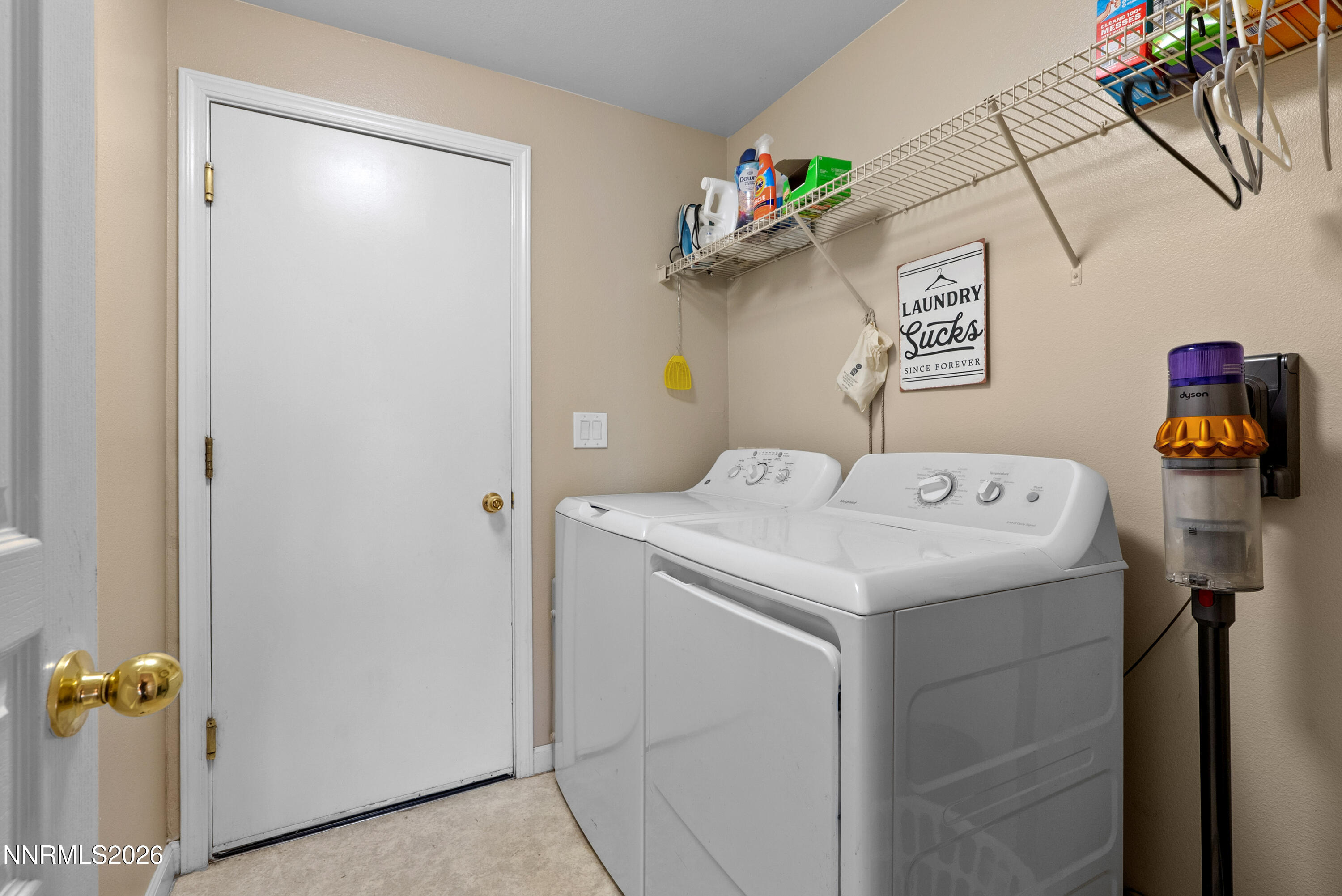 552 Spur Court Fernley, NV 89408 - Photo 36 of 46 a utility room with dryer and washer