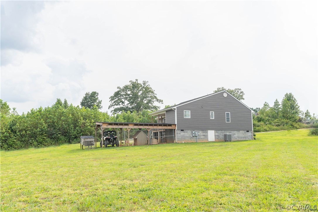 14701 Baltimore Road Dewitt, VA 23840 - Photo 17 of 18 Integrated covered Dog Kennel & storage in crawl s