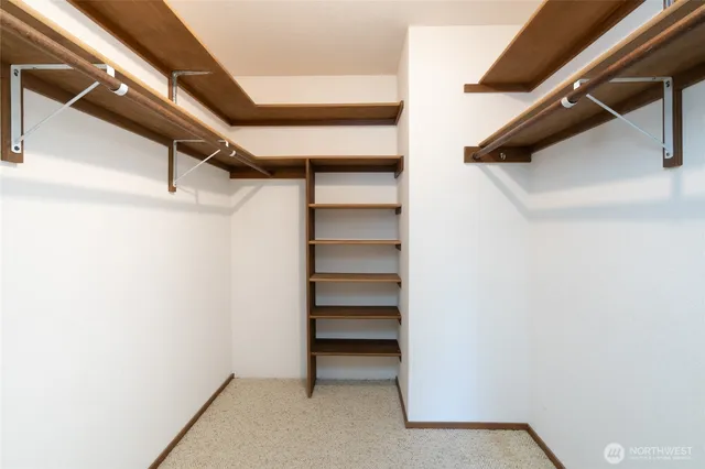 a view of an empty walk in closet