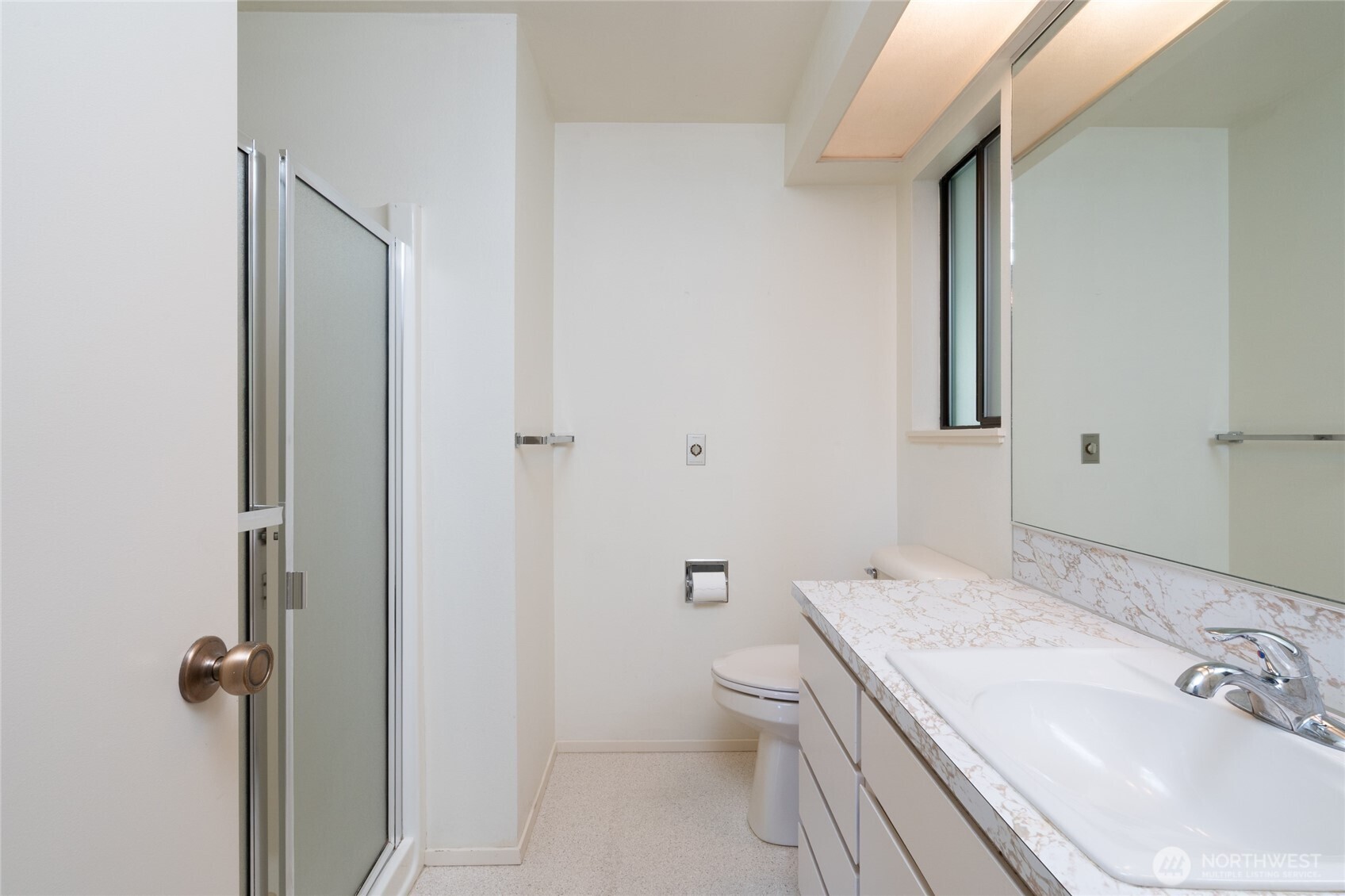 379 Snohomish Drive La Conner, WA 98257 - Photo 17 of 40 a bathroom with a sink toilet and shower