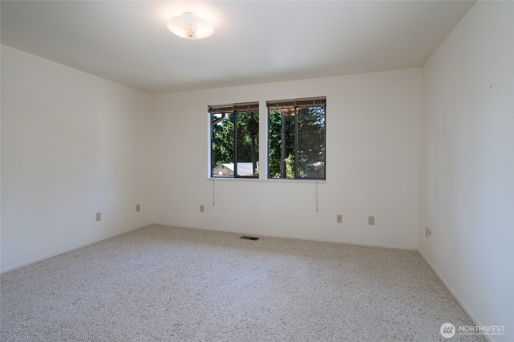 379 Snohomish Drive La Conner, WA 98257 - Photo 30 of 40 an empty room with a window