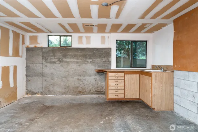 an empty room with windows