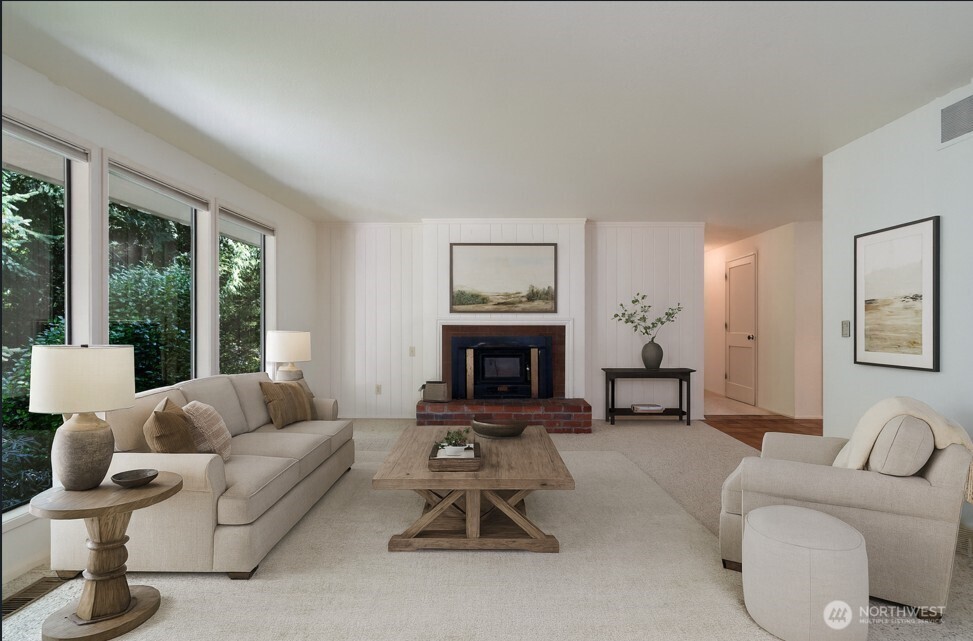 379 Snohomish Drive La Conner, WA 98257 - Photo 5 of 40 a living room with furniture and a fireplace