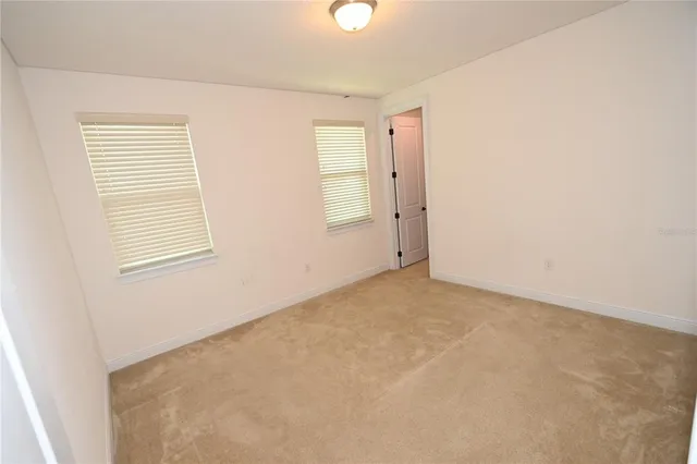 a view of a house with a big yard