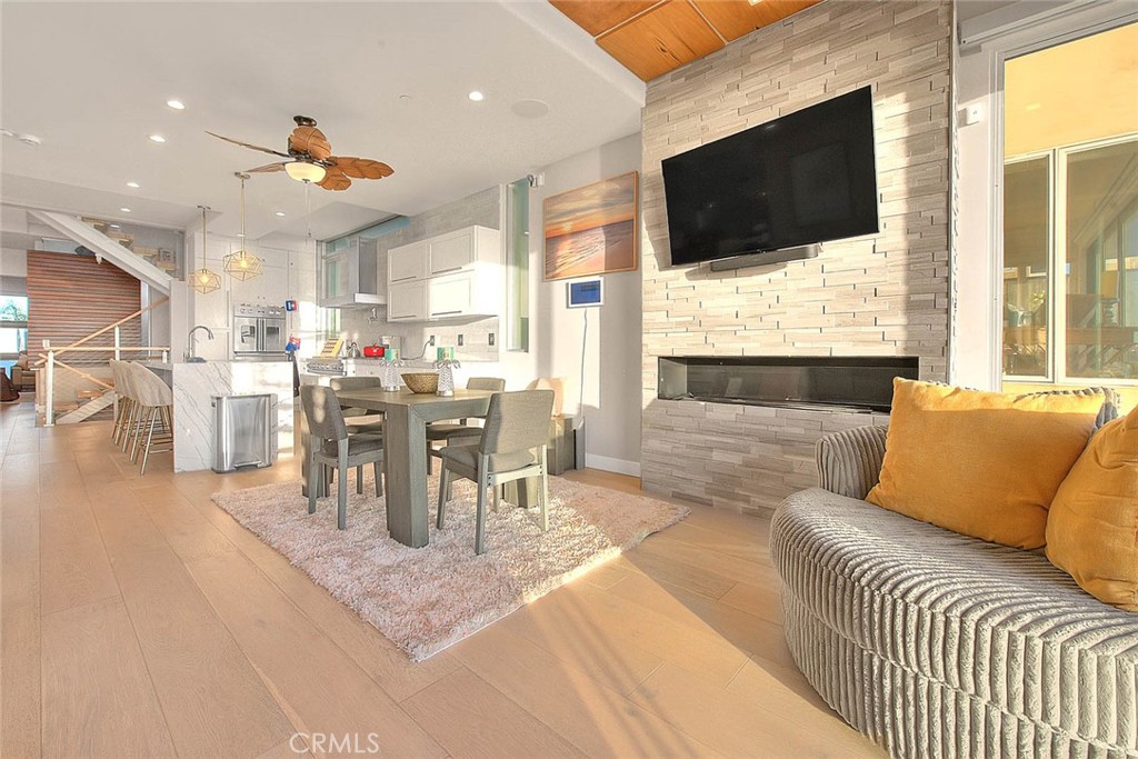 99 A Surfside Avenue Surfside, CA 90743 - Photo 27 of 75 a living room with furniture and a flat screen tv