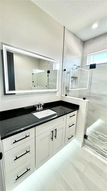 17665 Southwest 61st Ln Road Dunnellon, FL 34432 - Photo 17 of 32 a kitchen with granite countertop a sink and cabinets
