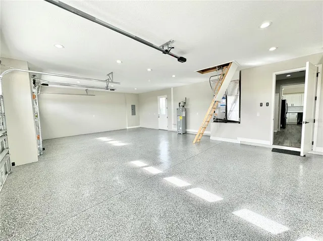 an empty room with stairs and white walls