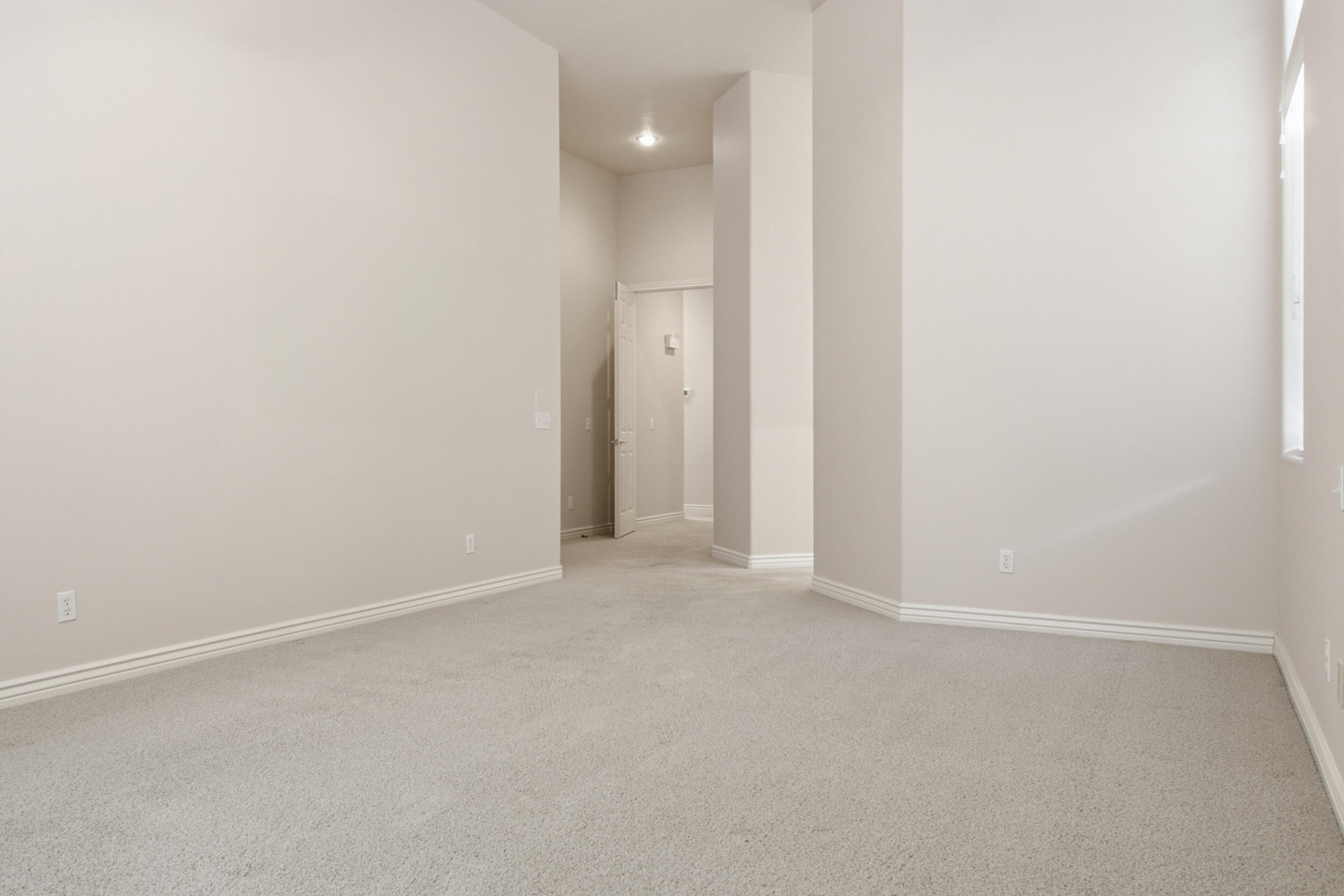 1073 Shadow Ridge Court, Unit 1073 Washington, UT 84780 - Photo 9 of 24 Primary bedroom looking toward hallway