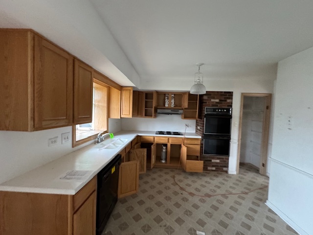 8135 West Rascher Avenue Chicago, IL 60656 - Photo 5 of 11 a kitchen with granite countertop a refrigerator and a stove