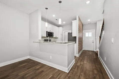 a view of a hallway with closet