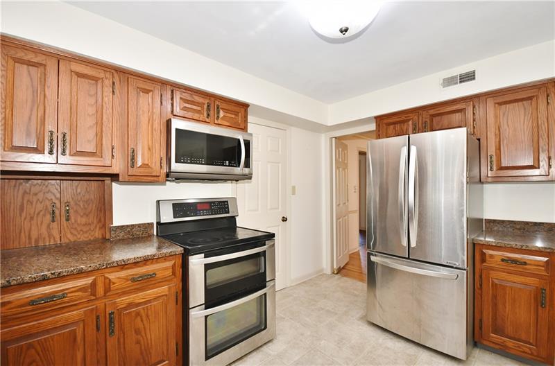 620 Foxhurst Road Pittsburgh, PA 15238 - Photo 12 of 23 Stainless steel appliances and granite counter tops
