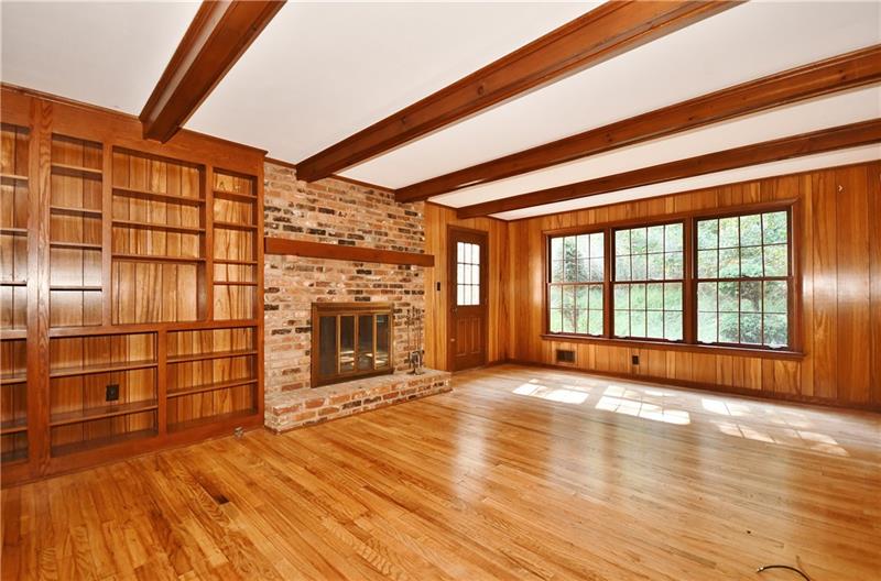620 Foxhurst Road Pittsburgh, PA 15238 - Photo 6 of 23 Cozy family room features built-ins and access to outdoor patio