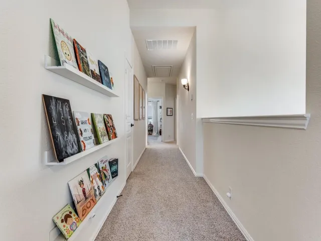 a room with furniture and flat screen tv