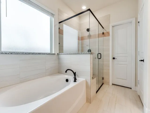 a bathroom with a sink and a shower