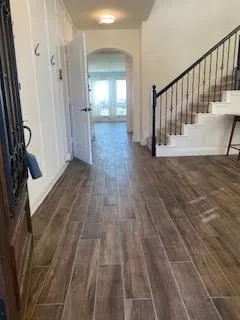 a view of entryway with stairs