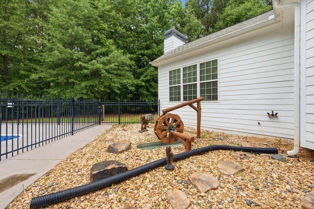 582 Knox Chapel Road Social Circle, GA 30025 - Photo 39 of 49 a view of a backyard with sitting area