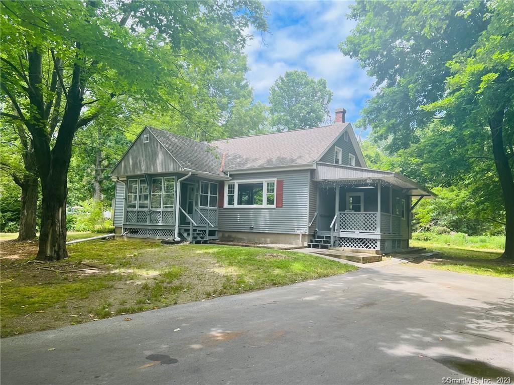 157 Ransom Hall Road Wolcott, CT 06716 - Photo 1 of 1 a front view of house with yard and green space
