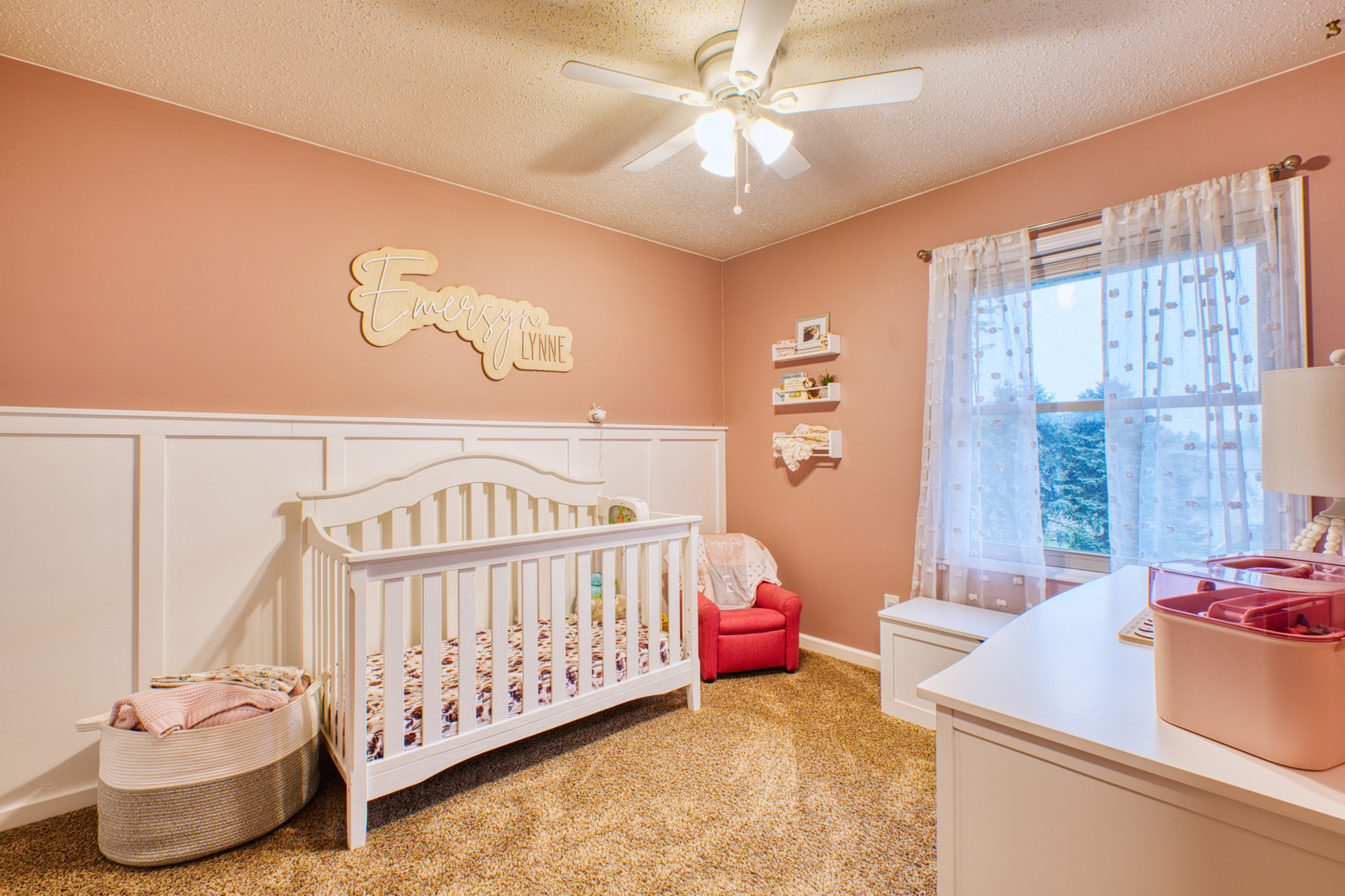2313 Lafayette Terrace Clinton, IA 52732 - Photo 17 of 39 a bedroom with a bed and a chandelier