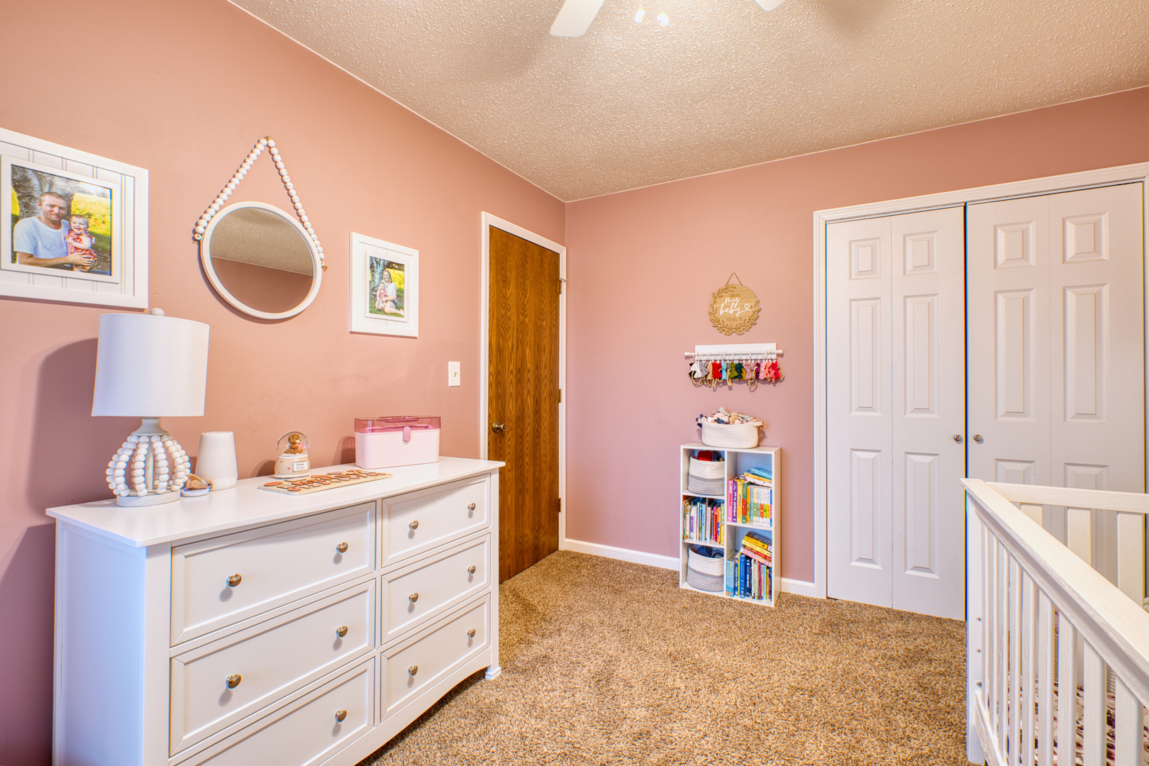 2313 Lafayette Terrace Clinton, IA 52732 - Photo 19 of 39 a bedroom with a bed and a mirror