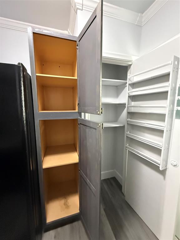 2121 Northeast 42nd Court, Unit 103C Lighthouse Point, FL 33064 - Photo 13 of 31 a room with storage and utility