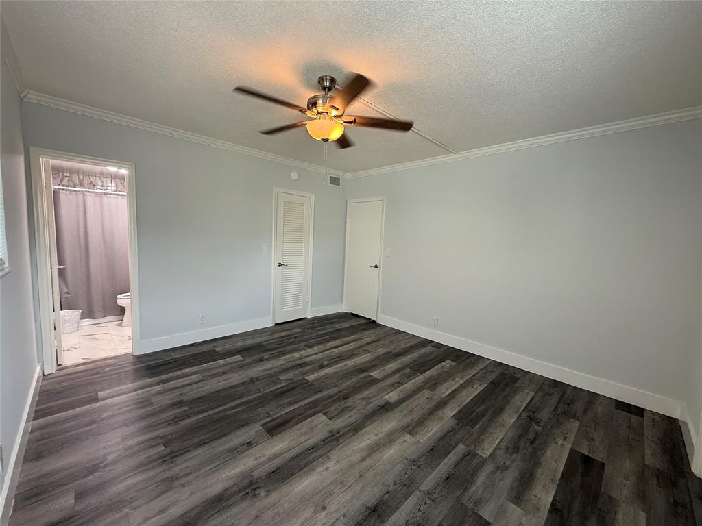 2121 Northeast 42nd Court, Unit 103C Lighthouse Point, FL 33064 - Photo 28 of 31 a view of empty room with wooden floor