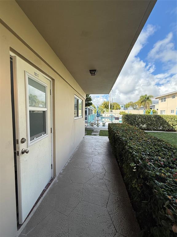 2121 Northeast 42nd Court, Unit 103C Lighthouse Point, FL 33064 - Photo 31 of 31 a view of a porch