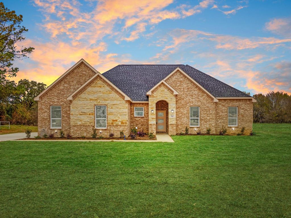 544 Shepherd Road Combine, TX 75159 - Photo 1 of 36 View of front facade with brick siding, a lawn, and roof with shingles