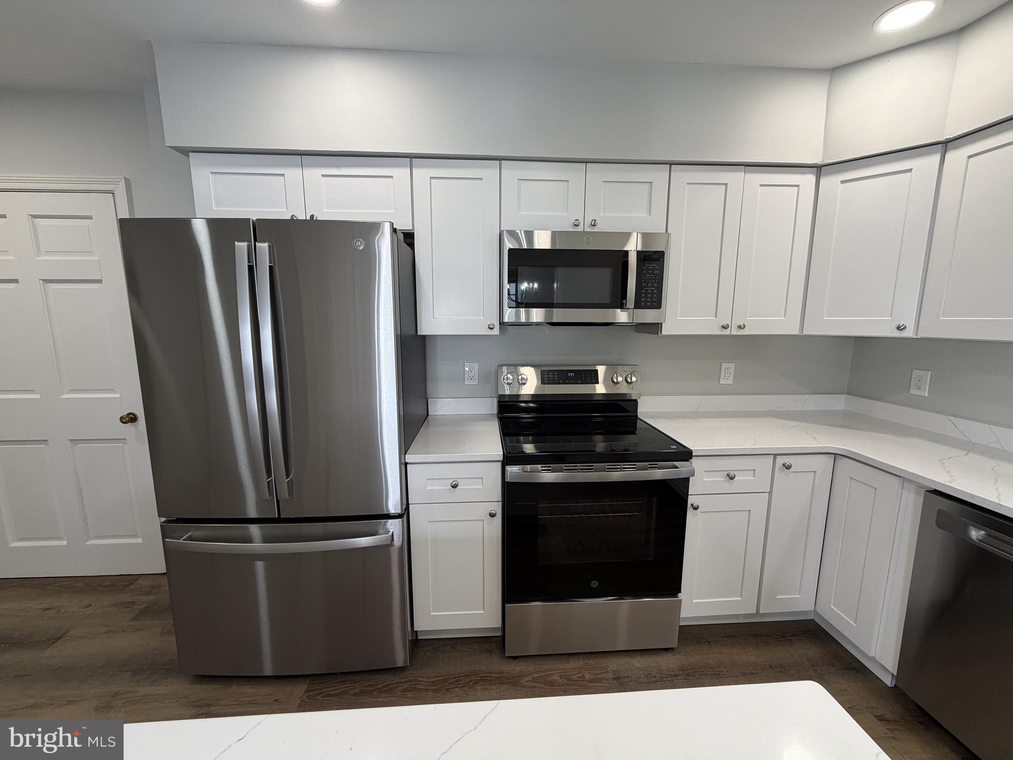 4700 Thompsons Bridge Road Wilmington, DE 19803 - Photo 11 of 41 a kitchen with a refrigerator sink and microwave