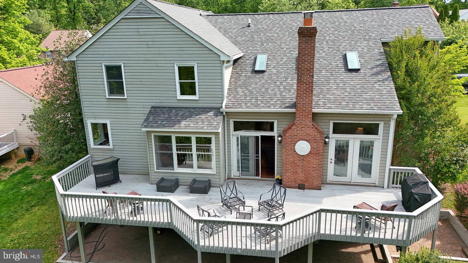 2108 Merrifields Drive Silver Spring, MD 20906 - Photo 54 of 69 a view of a house with a table and chair
