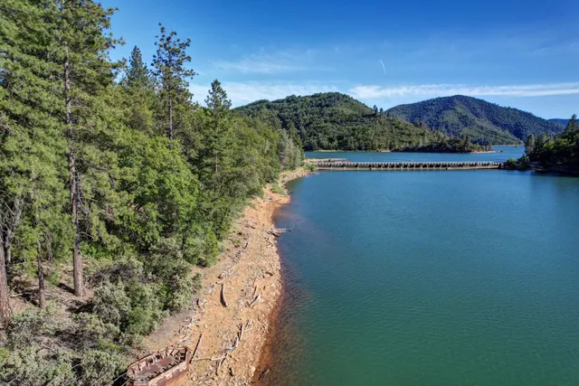 a view of a lake with mountains in the background