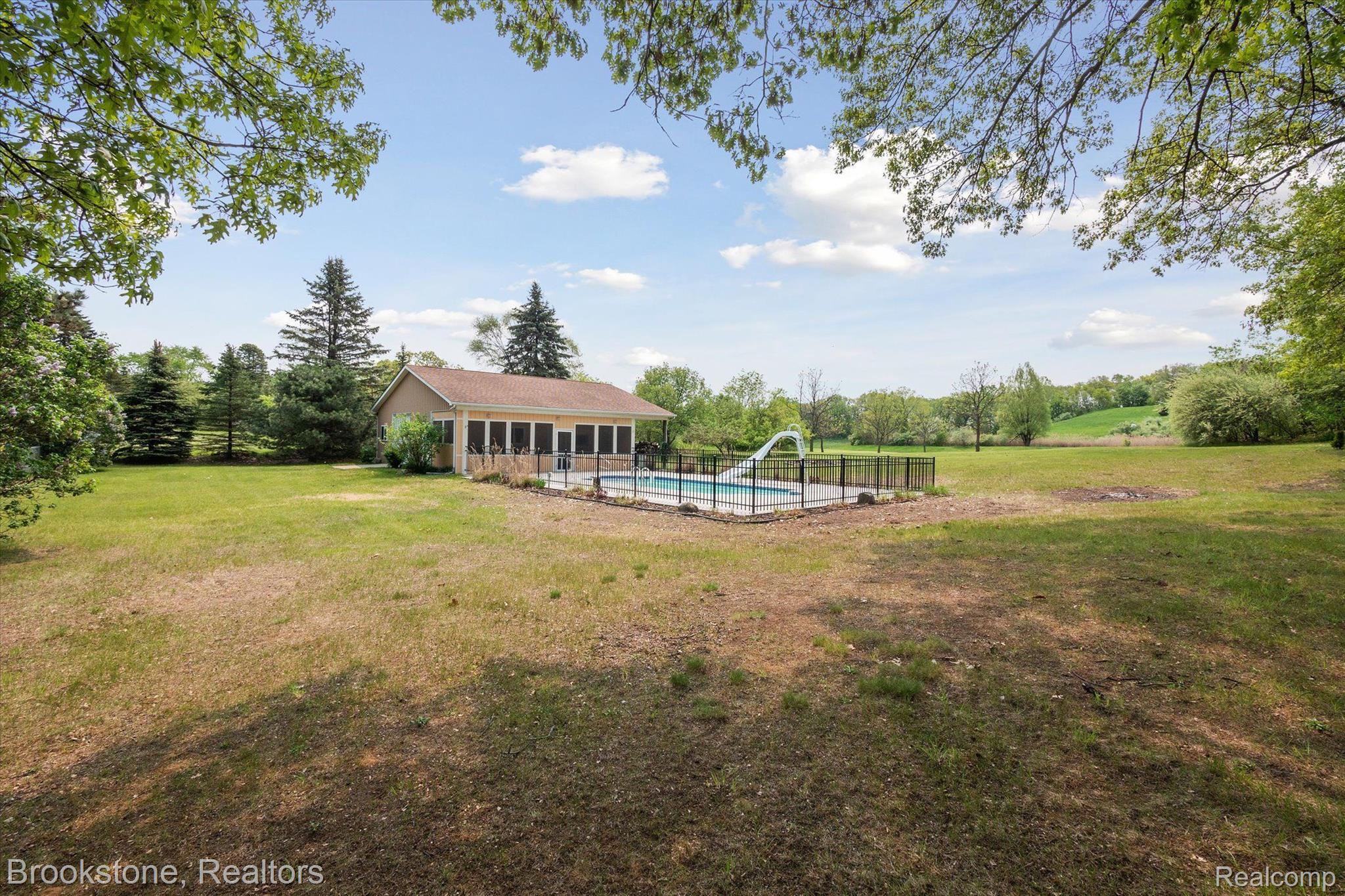 2869 Judah Road Lake Orion, MI 48359 - Photo 43 of 52 VIEW OF POLE BARN/POOL HOUSE AND POOL