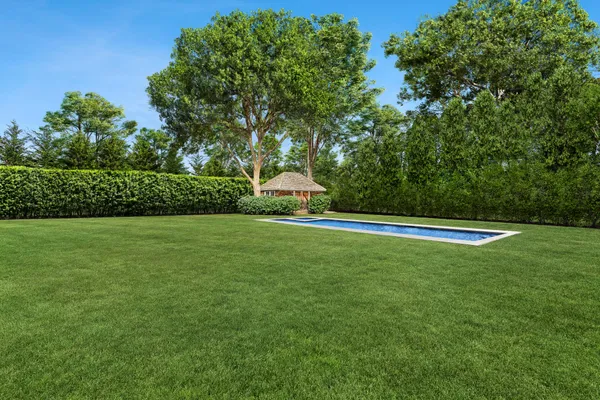 a view of a garden and basketball court