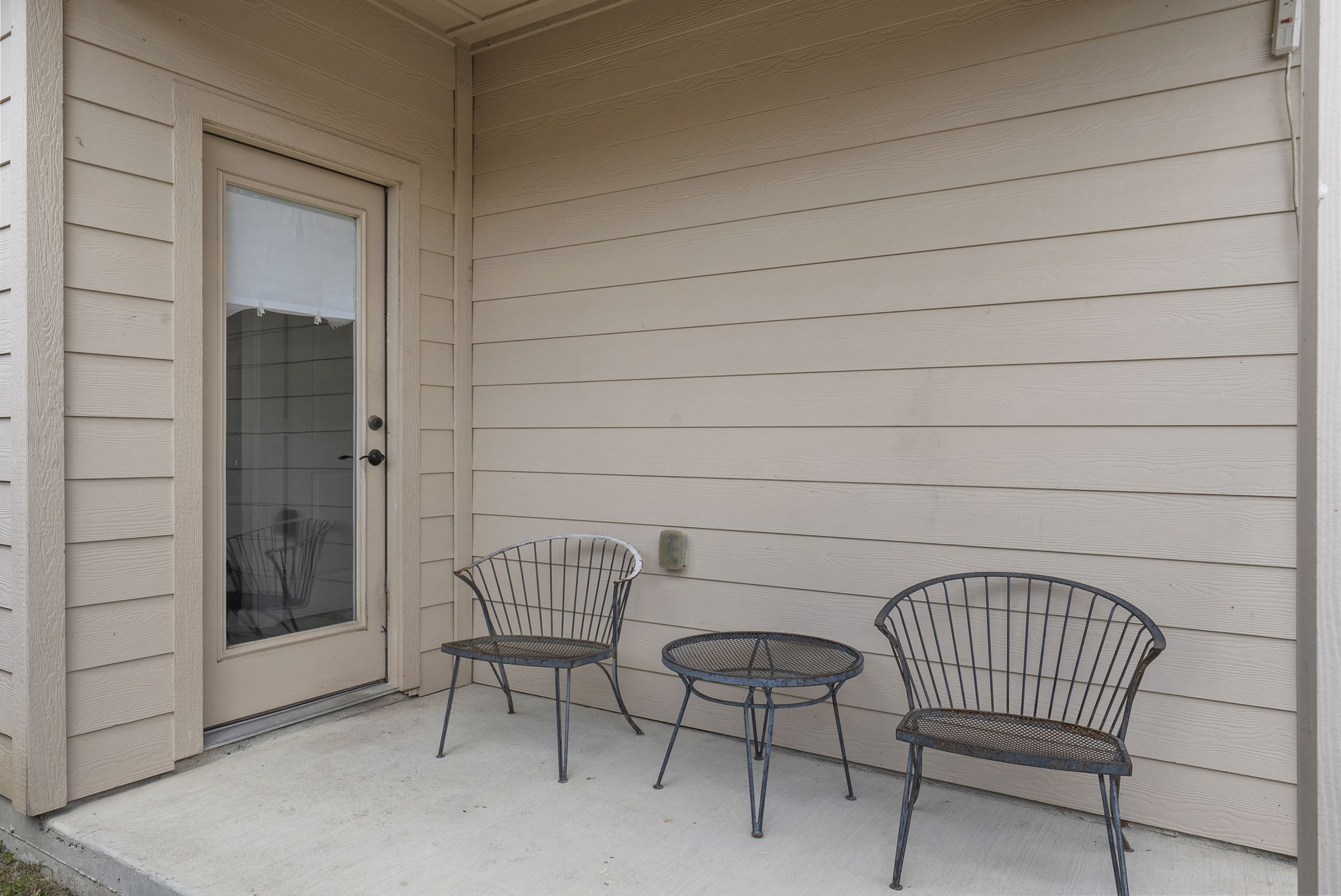 1617 Treeta Trail Kyle, TX 78640 - Photo 36 of 39 a view of a chair and bench in the room