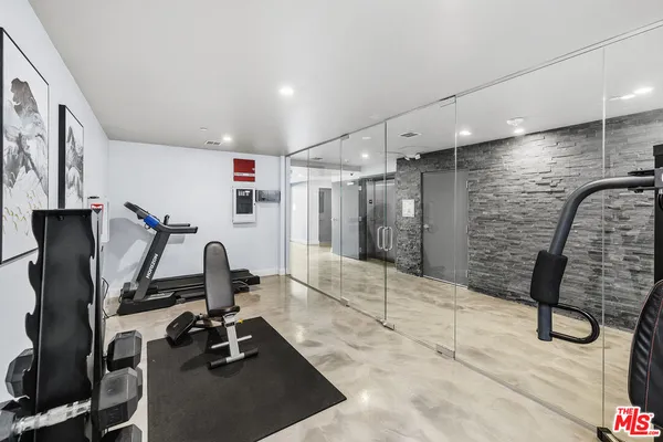 a view of a room with gym equipment