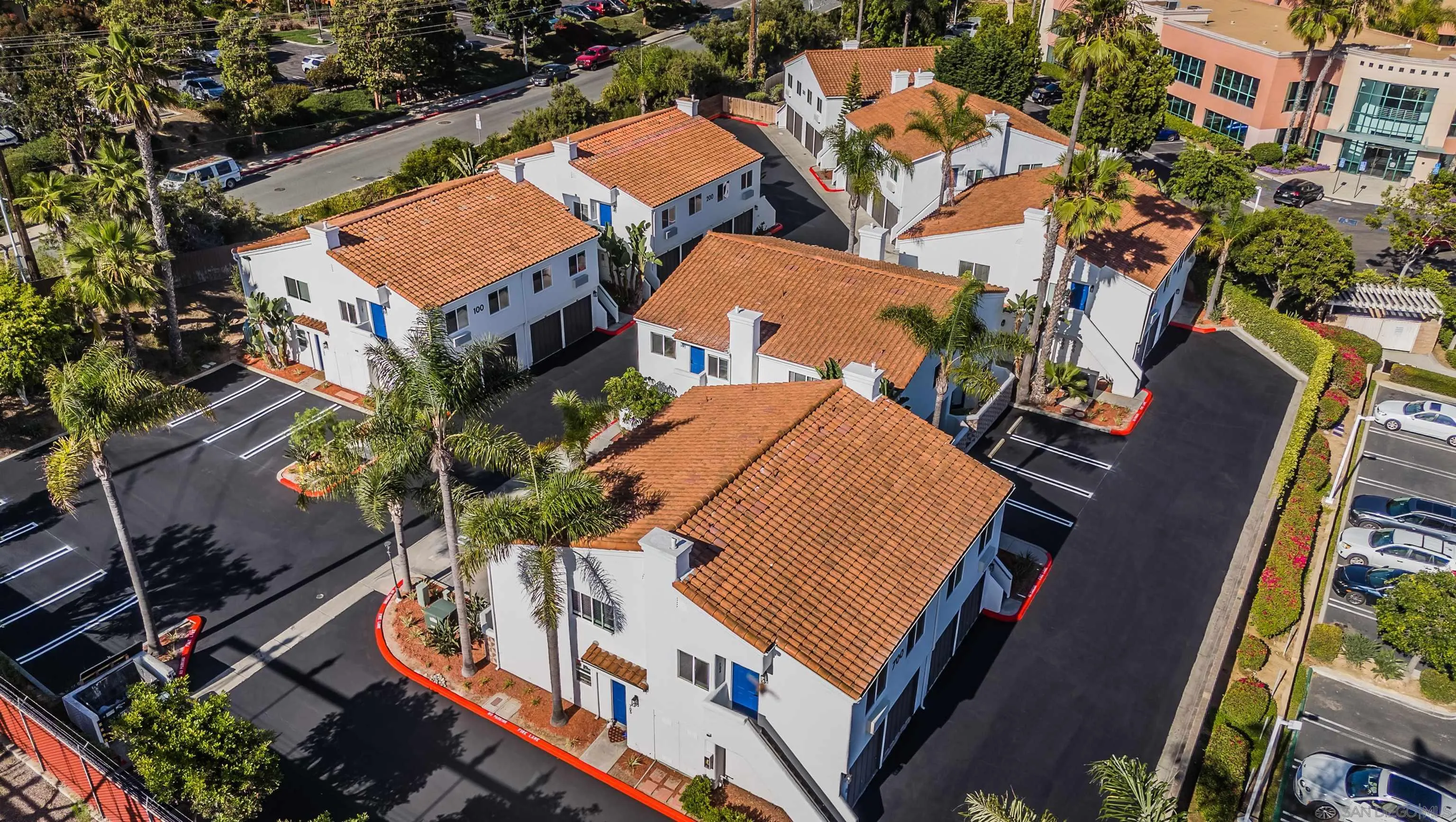 an aerial view of a house with outdoor space