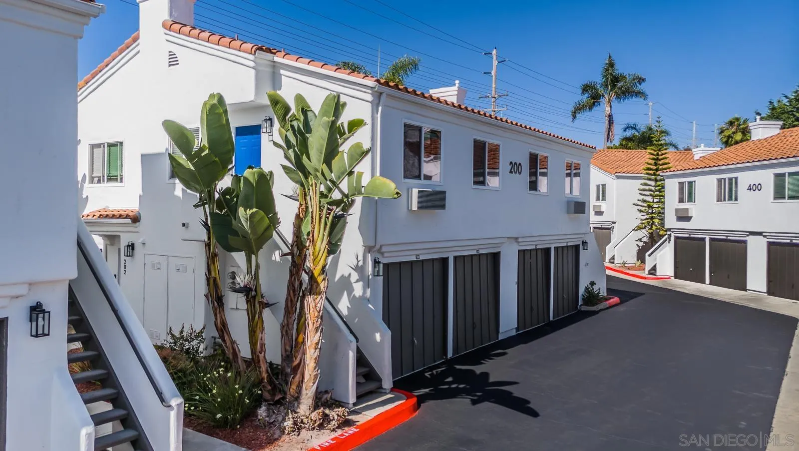 185 Saxony Road Encinitas, CA 92024 - Photo 4 of 14 a view of a house with fountain in front of it
