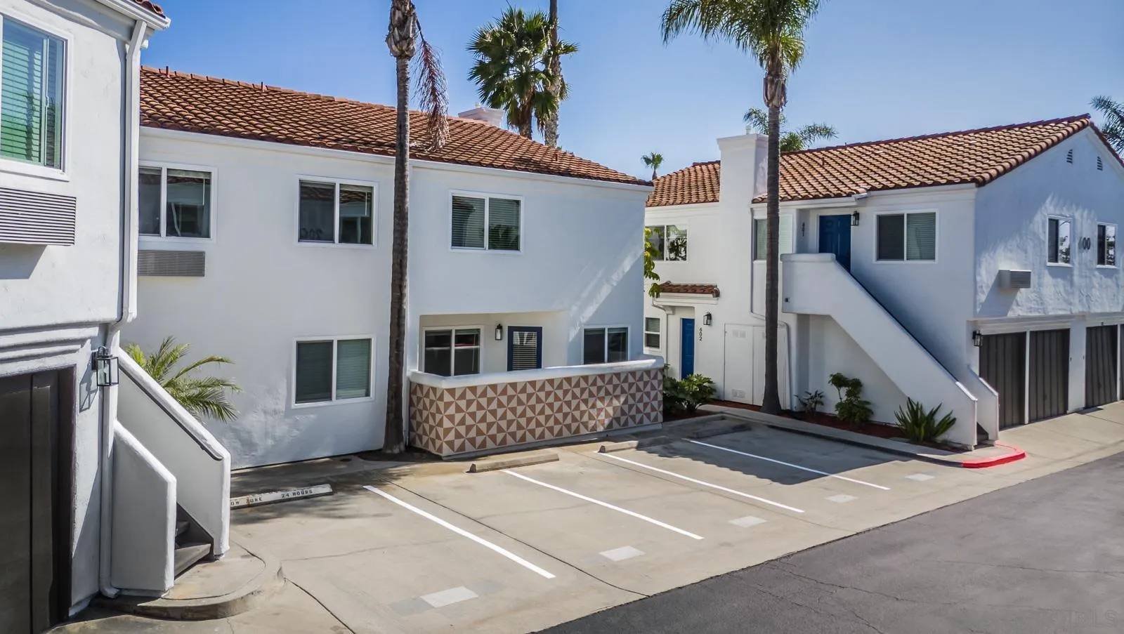 185 Saxony Road Encinitas, CA 92024 - Photo 6 of 14 a front view of a house with a garage