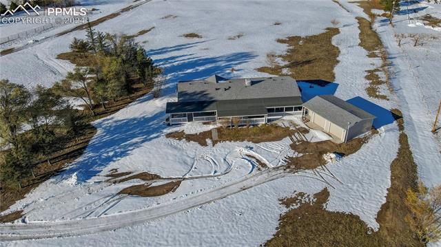 6605 Rio Road Peyton, CO 80831 - Photo 9 of 14 View of snowy aerial view