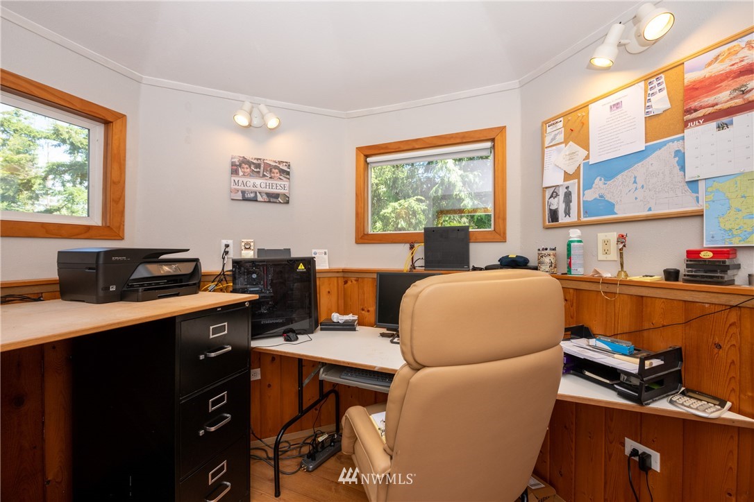 3625 Green Cliffs Road Anacortes, WA 98221 - Photo 21 of 26 a view of a workspace with furniture and a window