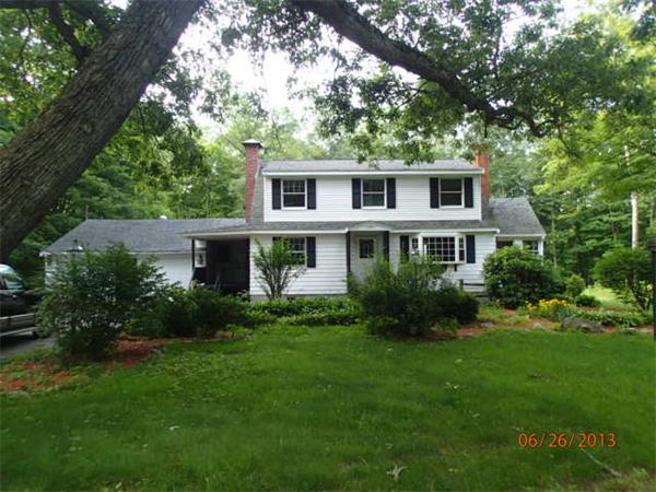 100 Cordaville Road Ashland, MA 01721 - Photo 1 of 11 a front view of a house with a yard and trees