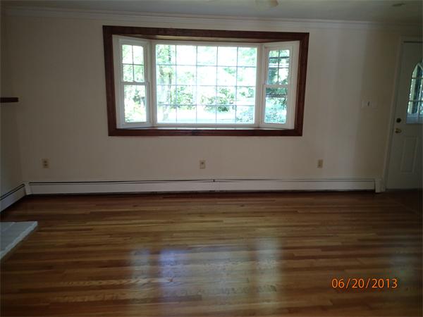 100 Cordaville Road Ashland, MA 01721 - Photo 9 of 11 a view of an empty room with wooden floor and a window