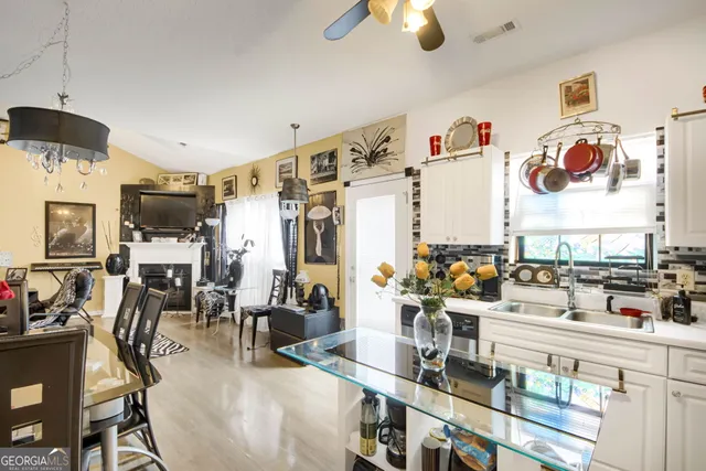 a view of a living room with furniture