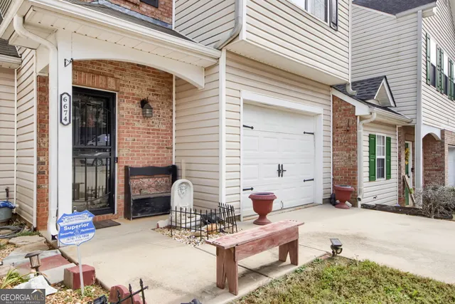 a view of backyard with seating space