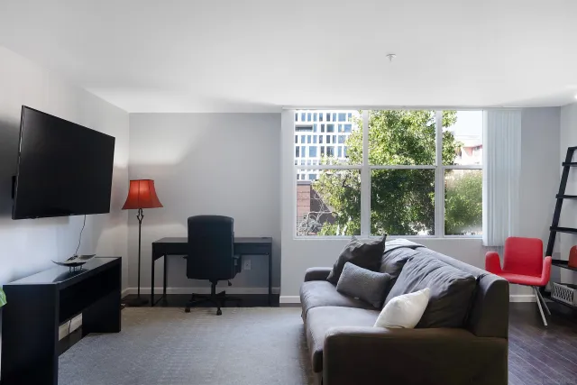 a room with furniture and a window