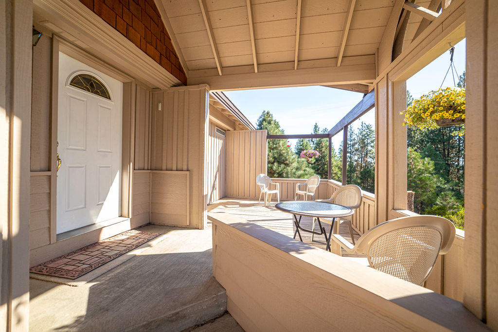 19132 Pumice Butte Road Bend, OR 97702 - Photo 6 of 49 a living room with large windows