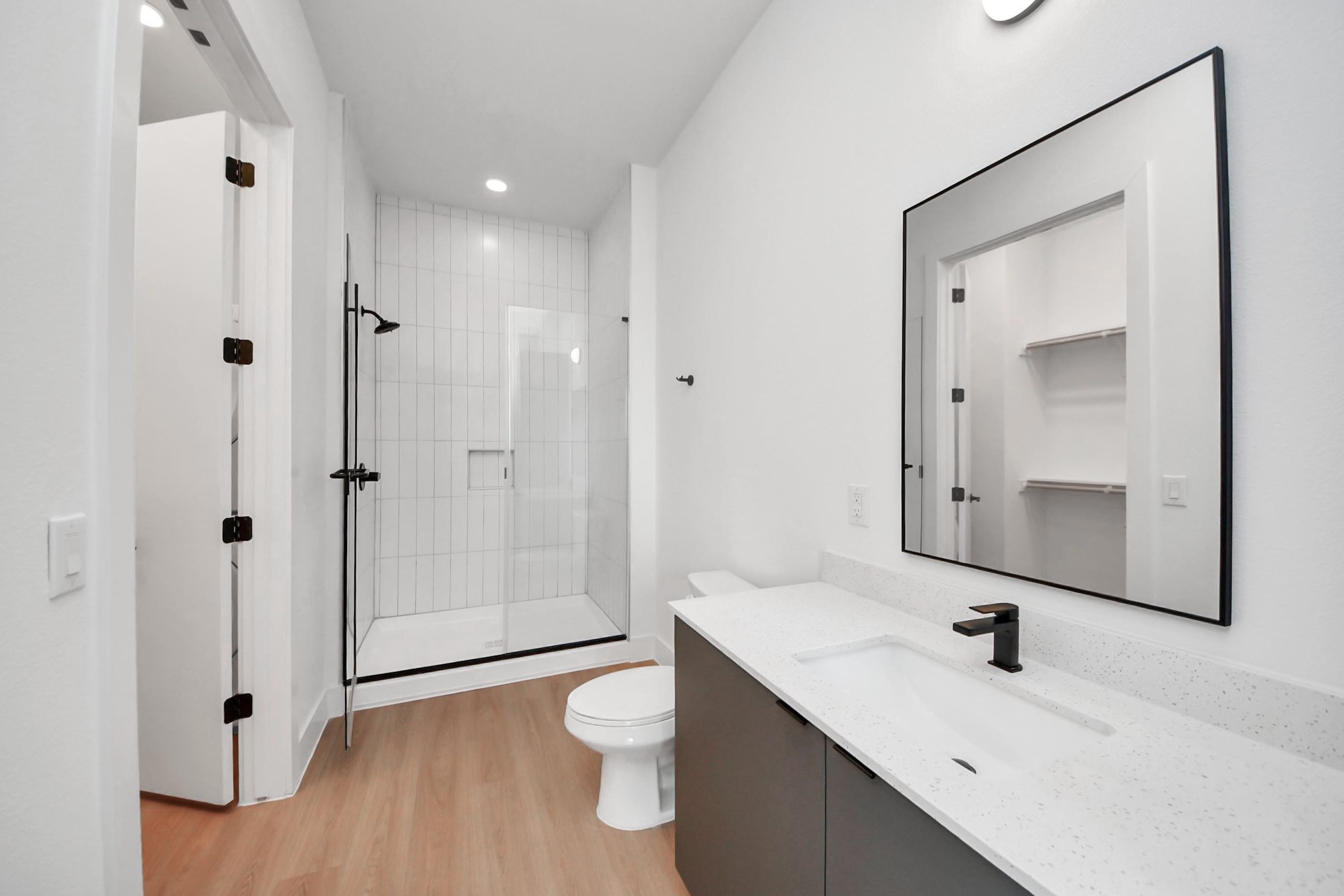 2810 Riverby Road, Unit 119 Houston, TX 77020 - Photo 17 of 38 a bathroom with a sink a toilet and shower