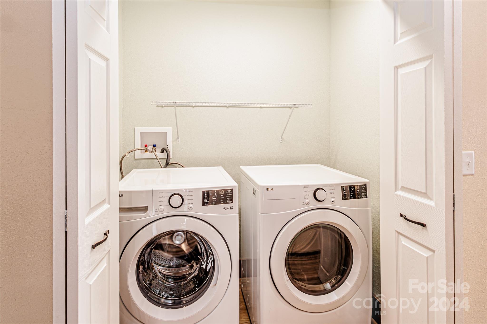 1233 Bryson Branch Road Bryson City, NC 28713 - Photo 17 of 28 a utility room with dryer and washer